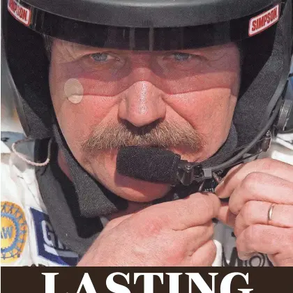  ?? DAVID TUCKER/DAYTONA BEACH NEWS-JOURNAL ?? Dale Earnhardt adjusts his helmet at Daytona Internatio­nal Speedway on Jan. 5, 2001, 13 days before he was killed in a last-lap accident during the Daytona 500.