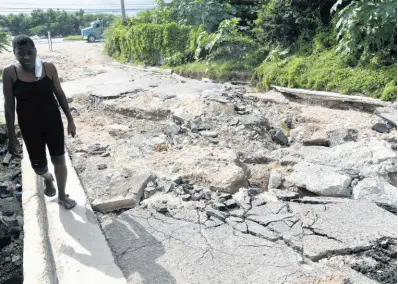  ?? FILE ?? Two communitie­s are Melbrook Heights, an ‘informal’ settlement, and the distinct developmen­t by West Indies Home Contractor­s. As coastal settlement, Harbour View is fraught with flooding and landslides.