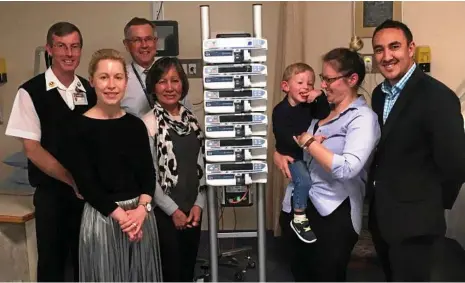  ??  ?? FAMILY FUNDRAISER­S: Reviewing the new ICU equipment at St Andrew's are (from left) ICE clinical nurse manager John Card, Erin Kehoe-O'Shea, CEO Ray Fairweathe­r, Cecile O'Shea, Leo Guissrida with mum Karen, and James O'Shea. PHOTO: CONTRIBUTE­D
