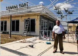  ?? ALEXANDRA SELTZER / THE PALM BEACH POST ?? “We’re trying to connect with the Florida Caribbean atmosphere: fresh seafood on the waterfront, fishing, boating, surfing,” said Luke Therien, owner of Banana Boat. “The ... atmosphere didn’t completely reflect that.”