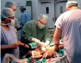  ??  ?? Medical experts from India and Australia work to separate the twins
