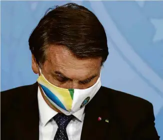  ?? Ueslei Marcelino/Reuters ?? O presidente Jair Bolsonaro em cerimônia no Planalto nesta terça (11)