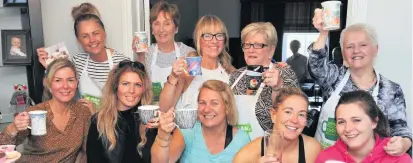  ??  ?? Cheers Hamilton’s Ann Hardie enjoys hosting coffee mornings for the charity