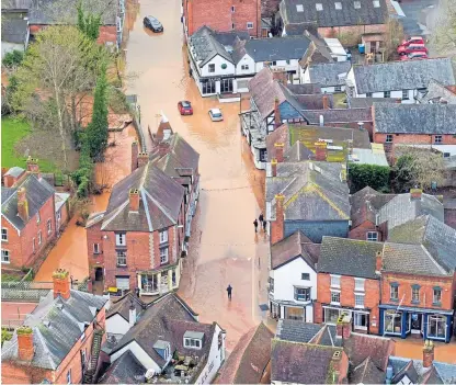  ?? Picture: PA. ?? Flooding in Tenbury Wells, Worcesters­hire, in the aftermath of Storm Dennis.