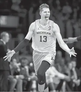  ?? Wally Skalij Los Angeles Times ?? MORITZ WAGNER, CELEBRATIN­G a three-pointer against Texas A&M in the regional semifinal, says his tongue-wagging is not intended as disrespect.