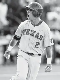  ??  ?? Kody Clemens celebrates while running by the dugout after he watches his first-inning homer.