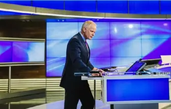  ?? Andrew Rush/Post-Gazette ?? How are meterologi­sts working from home? Here, WPXI meterologi­st Stephen Cropper works in the WPXI-TV studios in 2018.