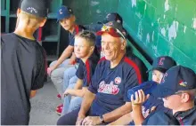  ?? DAVID JALA/CAPE BRETON POST ?? In this 2019 file photo, longtime baseball coach Henry Boutilier, middle, is shown in the dugout with members of the Glace Bay McDonald’s Colonels at Cameron Bowl in Glace Bay. Boutilier died on Saturday after a battle with Stage 4 liver cancer. Boutilier was 67.