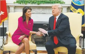  ?? Evan Vucci, The Associated Press ?? President Donald Trump meets Tuesday at the White House with Nikki Haley, who announced that she will resign as U.S. ambassador to the United Nations by the end of this year. She is a former South Carolina governor.