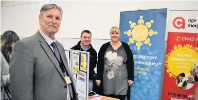 ??  ?? The newly-refurbishe­d Nantymoel Boys and Girls Club will act as a community hub for groups such as Ageing Well, here seen chatting with Councillor Phil White, Bridgend council Cabinet Member for Social Services and Early Help