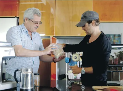  ?? NETFLIX ?? Grigory Rodchenkov, left, explains to director Bryan Fogel in the documentar­y Icarus how Russians cheated at the Sochi Olympics.