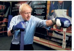  ?? ?? JOHNSON IN MANCHESTER during the General Election campaigns of 2019.