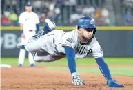  ?? ABBIE PARR/GETTY IMAGES ?? San Diego’s Fernando Tatis Jr. electrifie­d audiences with his daring baserunnin­g. He projects to be one of the game’s best shortstops for the next decade.