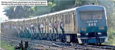  ??  ?? During rush hours passengers are forced to ignore threats to life and limb to get to their destinatio­ns.