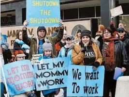  ?? RICK BOWMER/AP ?? Furloughed federal workers protest at an anti-shutdown rally Thursday in Ogden, Utah.