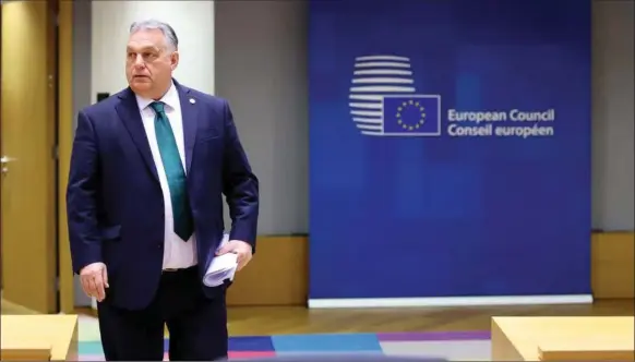  ?? ?? Det frygtede drama om ungarske Viktor Orbans holdning til EU-støtte til Ukraine udeblev. Det løste EU fra det dilemma, man kunne komme til at stå i, hvis han havde modsat sig støtte. Foto: Johanna Geron/Reuters