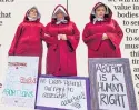  ??  ?? Protest: female ‘handmaids’ in Alabama