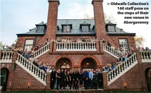  ?? ?? > Oldwalls Collection’s 160 staff pose on the steps of their new venue in Abergavenn­y