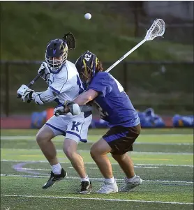  ?? PETE BANNAN — MEDIANEWS GROUP ?? Kennett’s Jake Freeberry (18) flips a backhand shot as Downingtow­n East’s Sam Barton (42) defends.