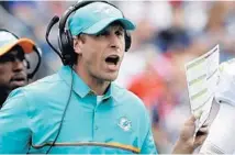  ?? STEVEN SENNE/AP ?? History in the South Florida sports landscape shows Miami Dolphins head coach Adam Gase and his players have their work cut out for them.