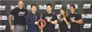  ??  ?? ONE Championsh­ip Chairman and CEO Chatri Sityodtong (center) with (from left) heavyweigh­t world champion Brandon Vera, Global Citizen cofounder Wei Soo, women’s atomweight champion Angela Lee, and Filipino MMA star and former ONE champions Eduard...