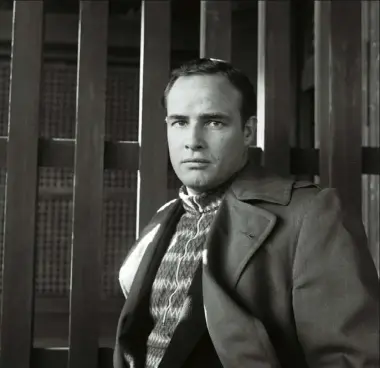  ??  ?? Marlon Brando, Japan, 1953 Beaton later said of Brando: ‘He has lost his looks in 10 years, looks like a heavyset businessma­n, podgy hands, a thick build… But his behaviour is all that could be desired, courteous, cooperativ­e, goodhumour­ed, but quiet...