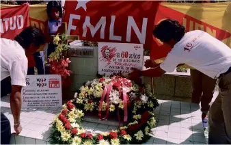  ??  ?? LEFT: In 1992, Salvadoran guerillas lay a wreath of flowers on the grave of rebel leader Farabundo Marti to mark the 60th anniversar­y of massacre of some 30,000 peasants by General Martínez’s army in 1932.