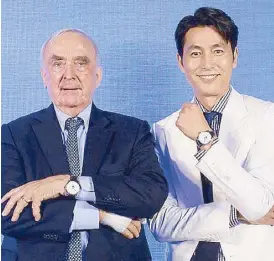  ??  ?? Walter von Känel, Longines president, and Jung Woo-Sung, Longines Ambassador of Elegance