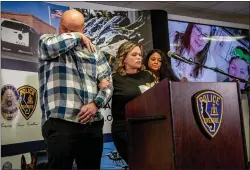  ?? GINA FERAZZI — LOS ANGELES TIMES ?? At a news conference this week, Michelle Blandin, center, grasps her husband’s arm while talking about her sister, Brooke Winek, and her parents, Mark and Sharie Winek, all three of whom were killed a week ago in Riverside, California.