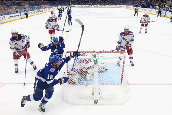  ?? Bruce Bennett, Getty Images ?? Lightning left wing Ondrej Palat celebrates scoring the game-winning goal past Rangers goalie Igor Shesterkin in Game 3 of the Eastern Conference Final of the Stanley Cup Playoffs at Amalie Arena on Sunday in Tampa, Fla.