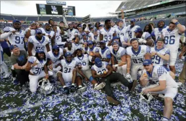  ?? JOHN RAOUX — THE ASSOCIATED PRESS ?? Kentucky players celebrate after defeating Penn State in the Citrus Bowl on Jan. 1 in Orlando, Fla.