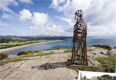  ??  ?? ABOVE The Tin Man is the third sculpture to have stood on the cliffs at Llanbedrog above Plas Glyn-y-Weddw (right); the first was made of wood