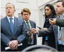  ?? THE ASSOCIATED PRESS ?? White House Press secretary Sean Spicer, left, speaks Monday to members of the media outside the White House.