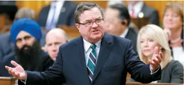  ??  ?? Jim Flaherty a annoncé, mardi, dans son Plan d'action économique 2014, qu'il mettait fin à son Programme d'immigratio­n des investisse­urs (PII).