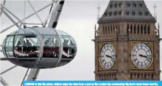  ??  ?? LONDON: In this file photo, visitors enjoy the view from a pod on the London Eye overlookin­g Big Ben’s clock tower and the Houses of Parliament in London. —AP