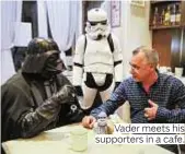  ??  ?? Vader meets his supporters in a cafe.