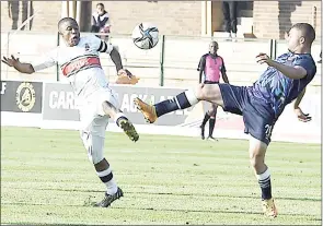  ?? (Pic: Kickoff.com) ?? University of Pretoria and Swallows FC fight for the ball during the PSL Promotion/Relegation playoff match at the Tuks Stadium yesterday.