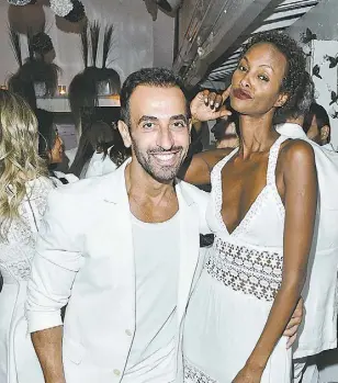  ??  ?? Toufik Sarwa and Yasmine Warsame attend the White Party