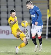  ??  ?? TOUGH GIG Holt battles with Ryan Kent in painful 1-0 reverse