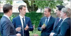  ??  ?? Tennis player Andy Murray chats with Britain's Prime Minister David Cameron (3rd R), Deputy Prime Minister Nick Clegg (L), opposition Labour Party leader Ed Miliband and Scottish National Party Westminste­r leader Angus Robinson (R) during a reception...