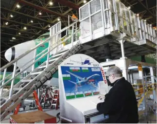  ??  ?? A worker is pictured at the Boeing production facility near Washington. Saudi Arabian Airlines is expected to start talks with both Boeing and rival Airbus about a narrow-body aircraft order before the end of the year. (Reuters)