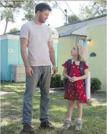  ?? WILSON WEBB/FOX SEARCHLIGH­T PICTURES ?? Chris Evans, left, and Mckenna Grace star in the new movie Gifted, which misses the mark.