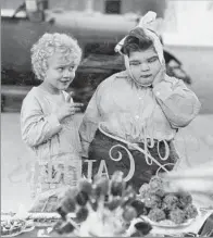  ?? CBS via Getty Images ?? ‘OUR GANG’ Jean Darling and Joe Cobb appear in a 1929 comedy short. She was also in the Broadway production of “Carousel.”