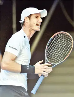  ?? — AFP photo ?? This file photo taken on January 22, 2017 shows Britain’s Andy Murray reacting after a point against Germany’s Mischa Zverev during their men’s singles fourth round match at the Australian Open tennis tournament in Melbourne.