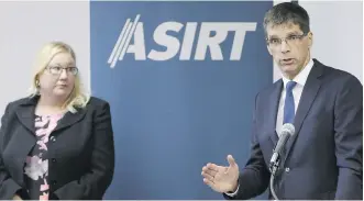  ?? GAVIN YOUNG ?? ASIRT executive director Susan Hughson and Eric Tolppanen, assistant deputy minister of justice for the Alberta Crown Prosecutio­n Service, speak during an ASIRT announceme­nt on Monday that there will be no charges in Anthony Heffernan’s death....