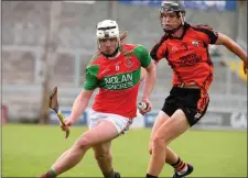  ??  ?? Crotta’s Barry Mahony in action against Ballyheigu­e’s Michael Leane during the first round Photo by Domnick Walsh / Eye Focus