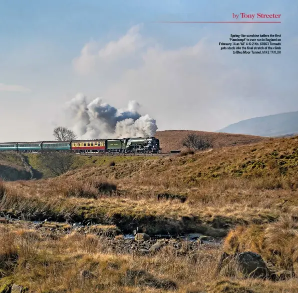  ?? MIKE TAYLOR ?? Spring-like sunshine bathes the first ‘Plandampf’ to ever run in England on February 14 as ‘A1’ 4-6-2 No. 60163 Tornado gets stuck into the final stretch of the climb to Blea Moor Tunnel.