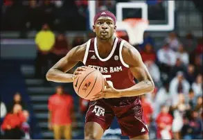  ?? Icon Sportswire / Icon Sportswire via Getty Images ?? Texas A&M guard Hassan Diarra is one of the players UConn has added through the transfer portal.