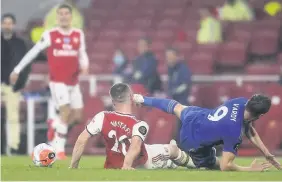  ?? KEVIN QUIGLEY/NMC POOL/GETTY IMAGES ?? INCIDENT: Shkodran Mustafi is caught in the face by Vardy’s boot after their collision. Right, Mustafi’s injuries and, below, Vardy apologisin­g
