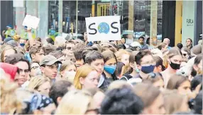  ?? Picture: RNZ ?? A sign during the students’ march in Auckland.